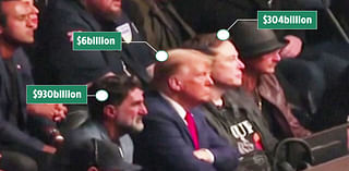 Donald Trump sits between two men worth $1.2TRILLION as President elect enjoys most exclusive seat in sport ever