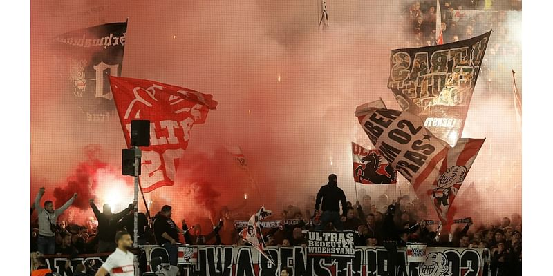 Ball boy injured after being hit in the neck by a burning flare during Champions League clash