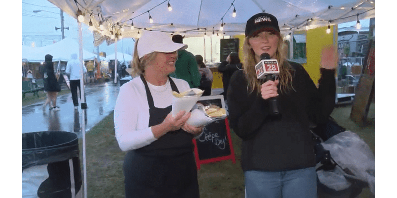 Guests grab the umbrellas to enjoy the 169th Bloomsburg Fair