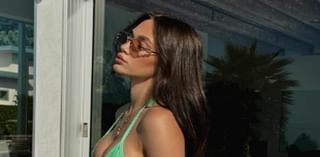 Phoebe Tomlinson displays her lithe physique in a lime green bikini as she shares a racy photo dump - 10 months after welcoming her first child