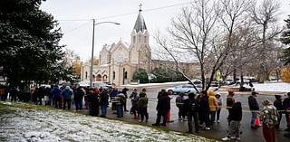 Free pizza and a DJ help defrost Montana voters lined up until 4 a.m. in the snow to vote