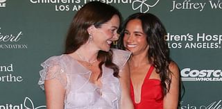 Meghan Markle is the ultimate supportive BFF as she affectionately holds hands with Kelly McKee Zajfen at charity gala