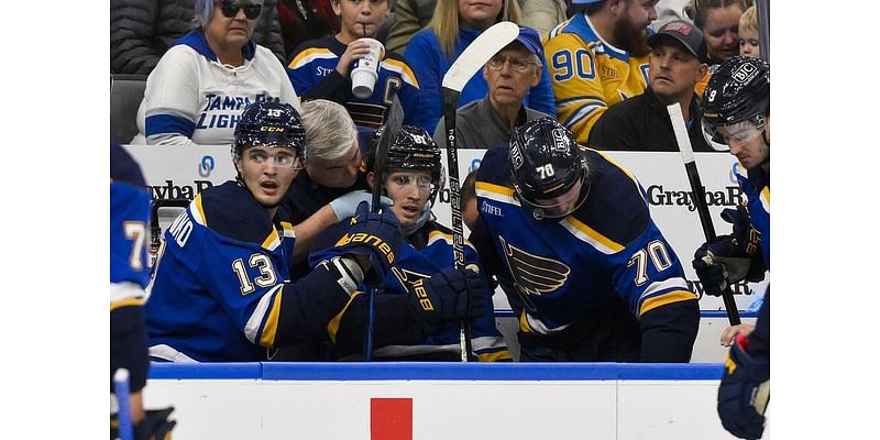 Blues F Dylan Holloway takes puck to neck, hospitalized