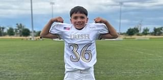 Football team rallies behind 9-year-old hit by car while riding scooter