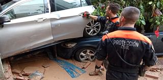 Valencia flood miracle as woman is found alive after being trapped with her dead sister-in-law for THREE days in their car - as rescue teams continue grim hunt for victims of deadly mega storm