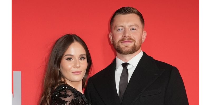 Holly Ramsay wows in a sexy sheer lace gown as she cosies up to dapper fiancé Adam Peaty at the GQ Men Of The Year awards