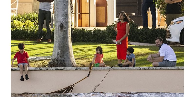 JD Vance and wife Usha play with their kids at Mar-a-Lago ... with a Secret Service robot dog lurking in the background