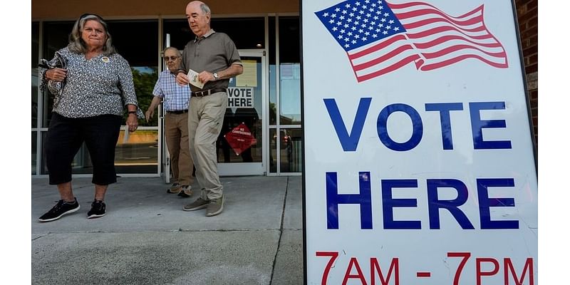 Georgia county trying to extend voting hours after polling centers hit with bomb threats