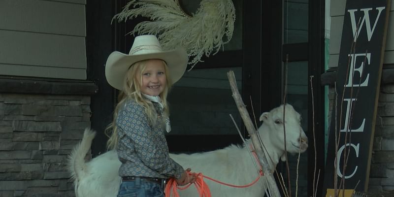 Goat tags along Trick-or-Treating with Correctionville family