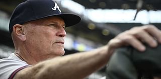 Braves manager Brian Snitker smiles 1 day after being hit below the belt by a foul ball