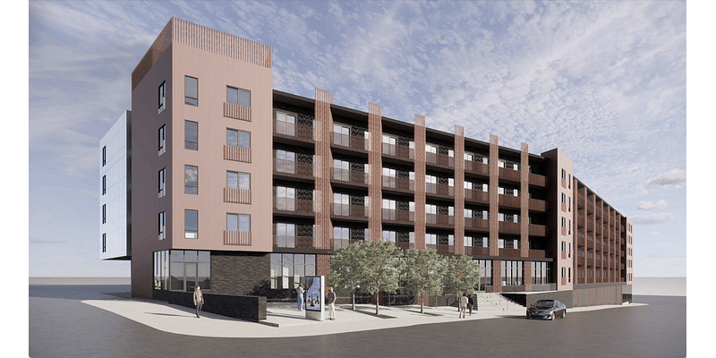 This Crossroads parking lot will soon house apartments with affordable units, rooftop deck