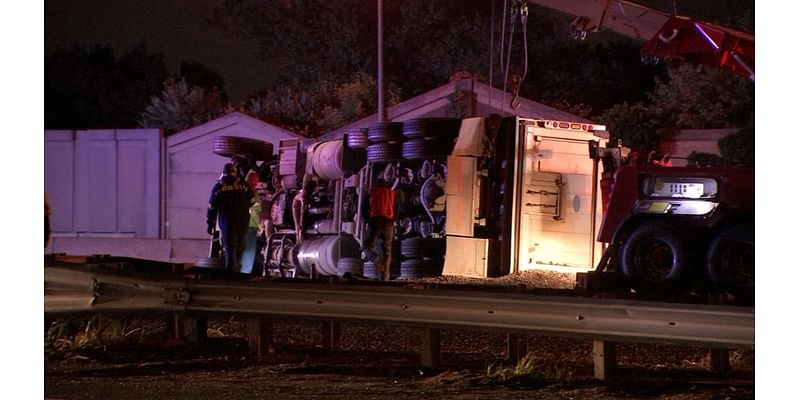 Overturned dump truck spills rocks on I-76 SB in Gloucester City, New Jersey