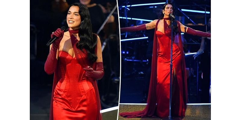 Dua Lipa brings the heat in red corset gown for Royal Albert Hall performance