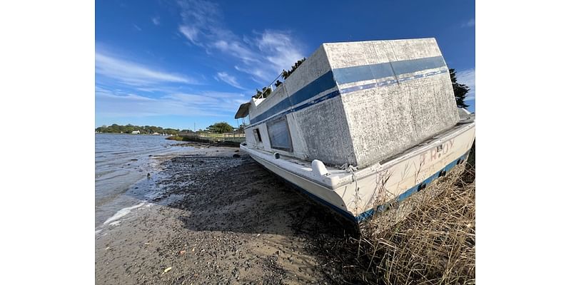 Another derelict boat in Elizabeth River awaits removal