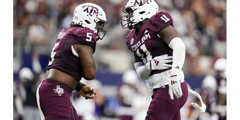 Marcel Reed throws for 2 touchdowns and runs for another in No. 24 Aggies’ 21-17 win over Arkansas