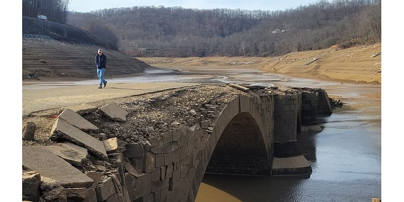 Reemergence of 206-year-old Great Crossings Bridge draws thousands to Yough Lake