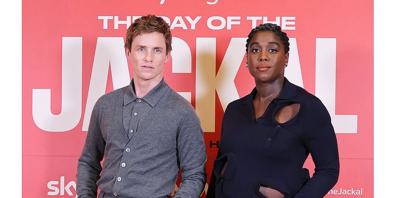 Pregnant Lashana Lynch shows off her growing baby bump in a cut-out dress as she joins dapper co-star Eddie Redmayne at The Day Of The Jackal screening in Rome