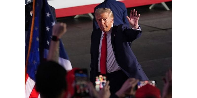 The Latest: Trump and Harris win reliable states while voters await battleground results