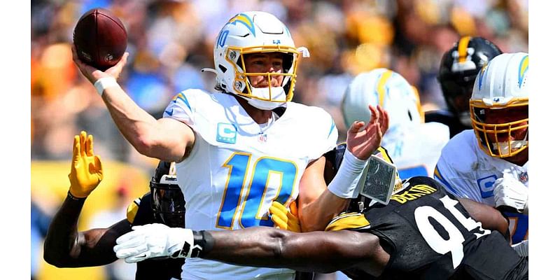 Los Angeles Chargers quarterback Justin Herbert exits Sunday's game with injury