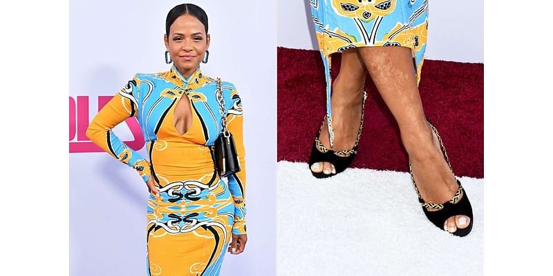 Christina Milian Deftly Handles Wardrobe Malfunction Ahead of Wolfs Premiere Red Carpet When Vintage Shoes Break