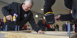 Volunteers build 20 beds for children in Lincoln