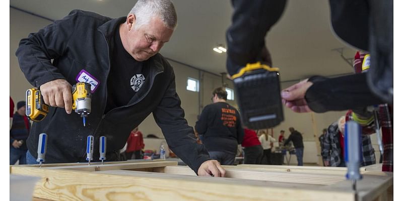 Volunteers build 20 beds for children in Lincoln