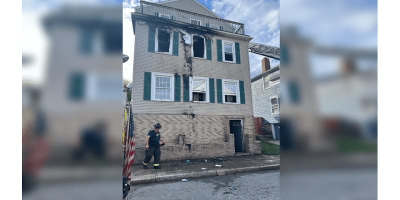 9 displaced by New Bedford house fire