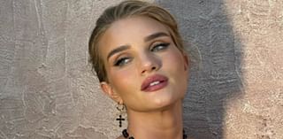 Rosie Huntington-Whiteley stuns in a semi-sheer lace jumpsuit as she poses for sizzling snaps in Sardinia