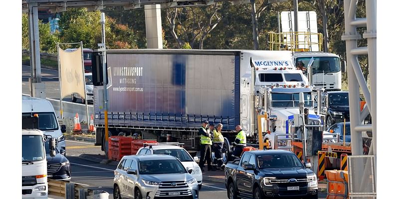 Commuter chaos after 'overheight vehicle' shut Sydney Harbour Tunnel during peak hour