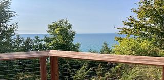 Lake Michigan overlook perches at end of accessible trail through dune backwoods