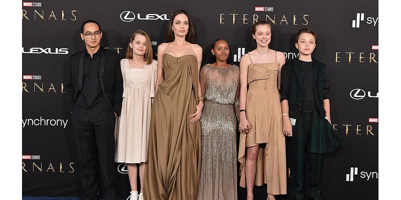 Angelina Jolie says she puts her 6 children 'first'... as ex Brad Pitt has not been photographed with the kids in over 8 YEARS