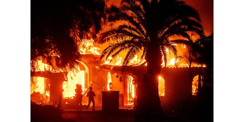 California wildfire destroys dozens of homes