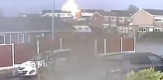 Shocking moment lightning strikes home and sparks 'explosion' - as neighbours are forced to evacuate