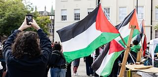 Pro-Palestinian protesters begin London march a year after October 7 attacks as police warn they'll arrest anyone showing support for Hamas or Hezbollah