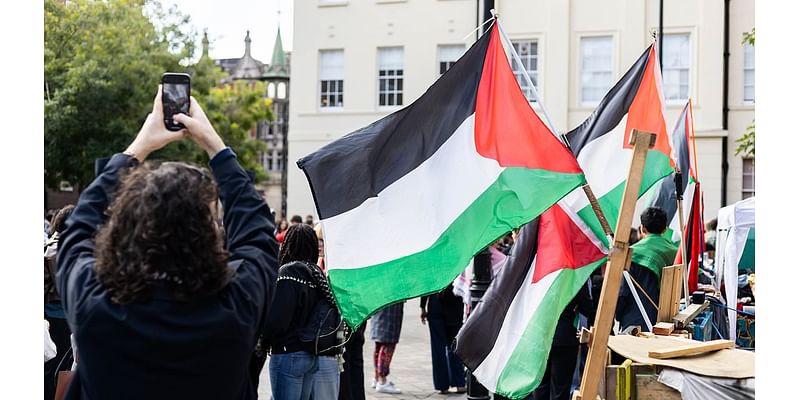 Pro-Palestinian protesters begin London march a year after October 7 attacks as police warn they'll arrest anyone showing support for Hamas or Hezbollah