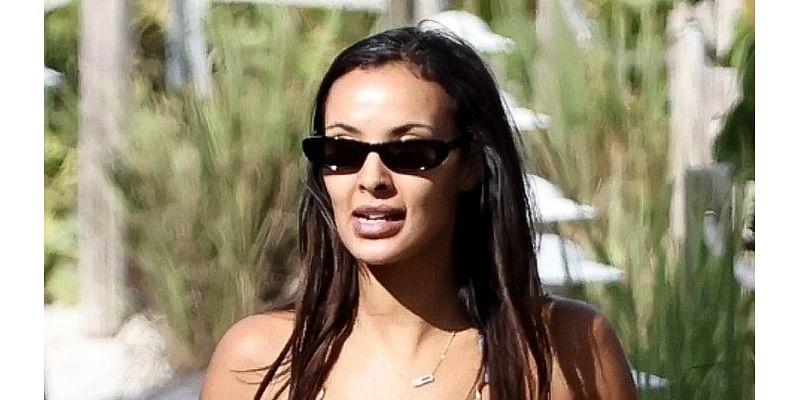 Maya Jama showcases her incredible figure in a ribbed lilac bikini as she joins internet personality Craig Mitch for a stroll around Miami after split with Stormzy