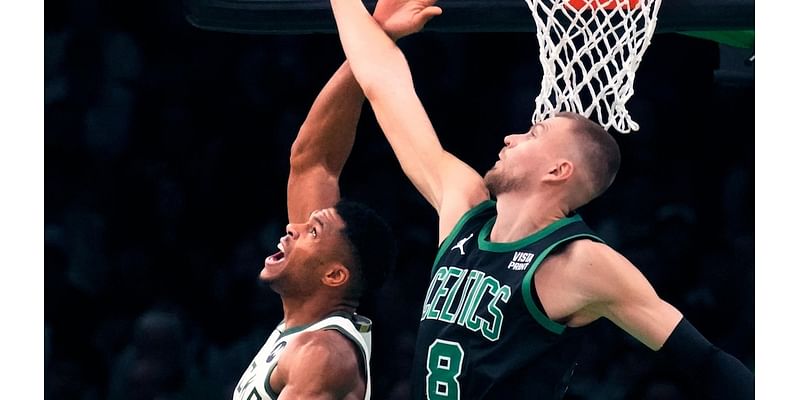 Tatum shakes off illness, helps Celtics slow Giannis and beat fellow East power Bucks 119-116