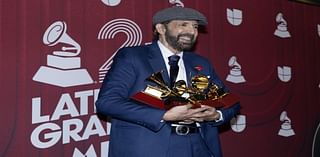 Luis Fonsi, Karol G walk the red carpet at Latin Grammy Awards