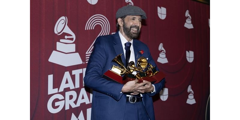 Luis Fonsi, Karol G walk the red carpet at Latin Grammy Awards