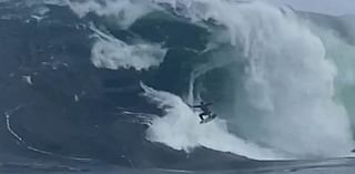 Terrifying moment surfer is wiped out by giant wave but miraculously survives