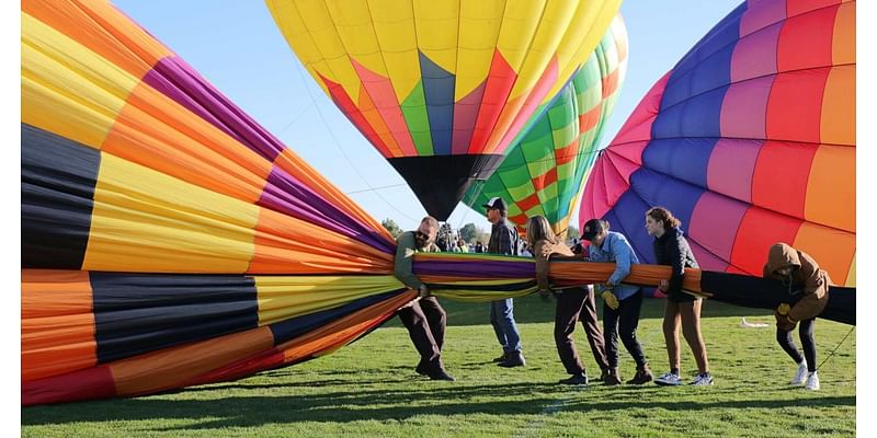 Heavy lifting: Hot air balloon crews see their efforts soar