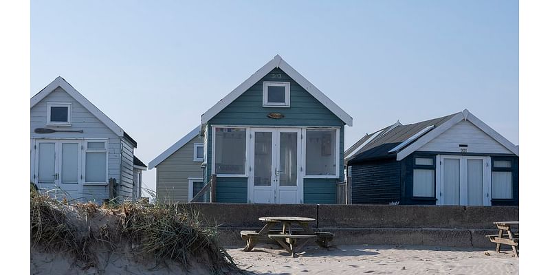 Cabin fever! Beach hut on remote Dorset sandbank sells for £485,000 within 24 hours of going on the market