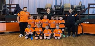 Local youth team scores with £500 Melville donation