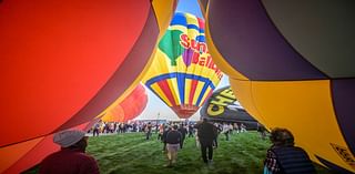 'Magical' flotilla of hot air balloons take flight at international fiesta amid warm temperatures