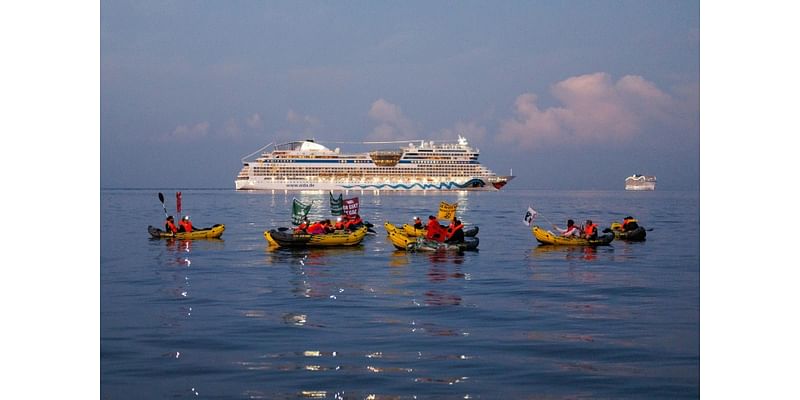 Environmental protesters block French cruise liner port