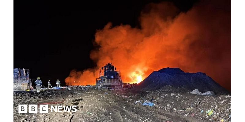 Fire crews from two counties spend night tackling landfill blaze