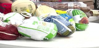 Lakeland food bank destroyed by arson returns with Thanksgiving drive-thru at Bartow High School