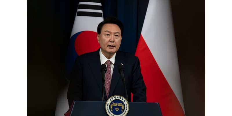 South Korea president apologises for controversies surrounding wife but says she was demonised