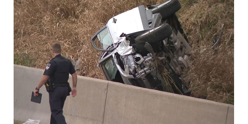 Vehicle down embankment at Forest Home and Layton in Greenfield