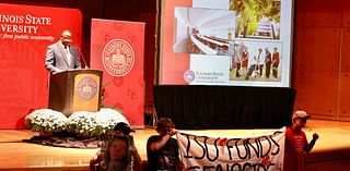 Students stage silent protest during Illinois State University's president speech